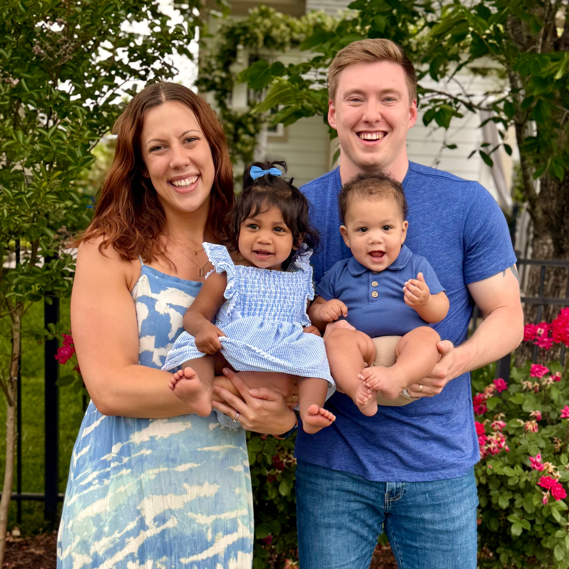A family with their two young children at home
